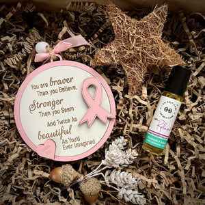 Christmas gift box for breast cancer survivor with decoration and aromatherapy roller oil