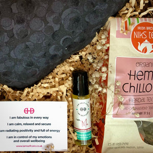 Care package with I Am Me aromatherapy roller oil