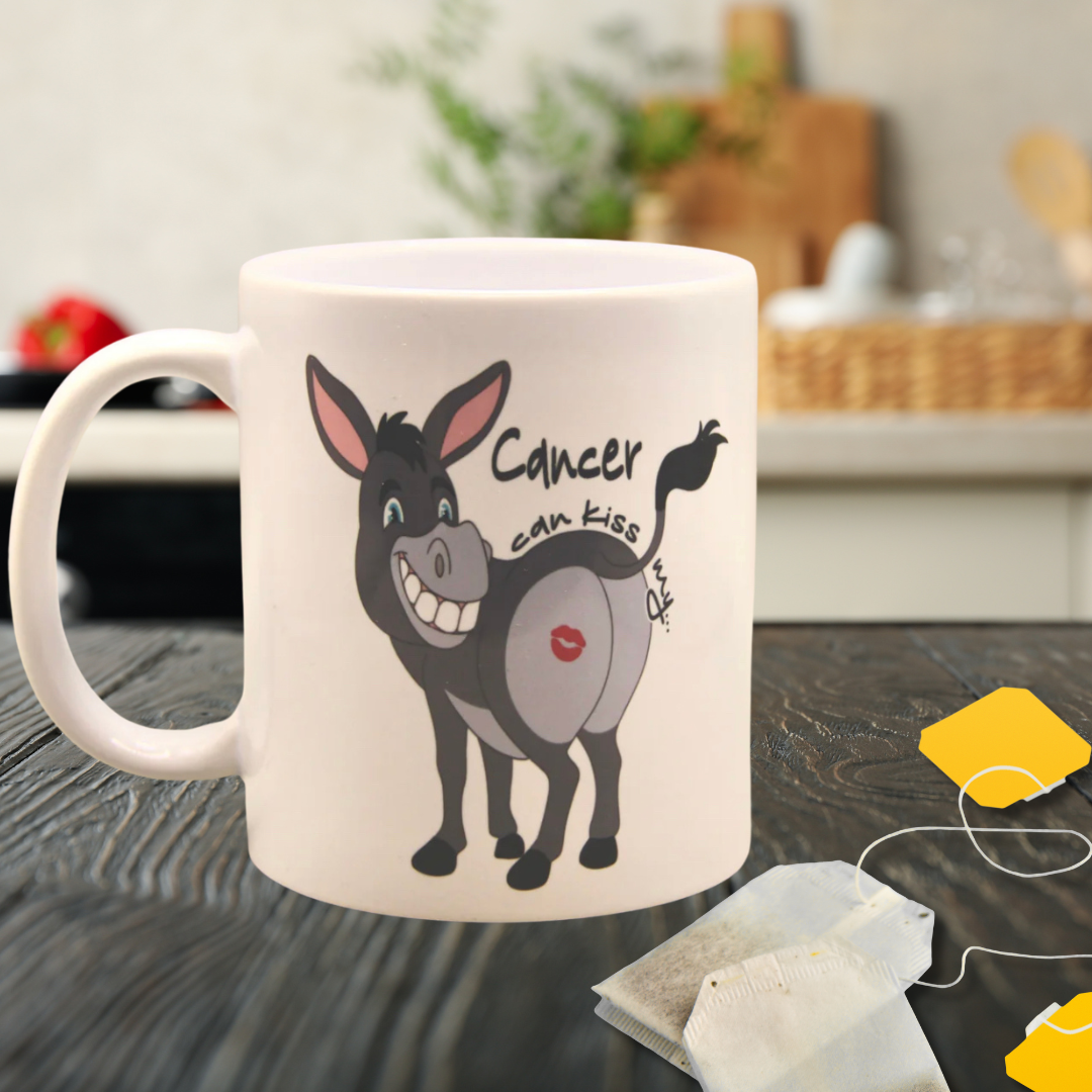 Cancer mug with a picture of a donkey saying 'Cancer can kiss my ...'